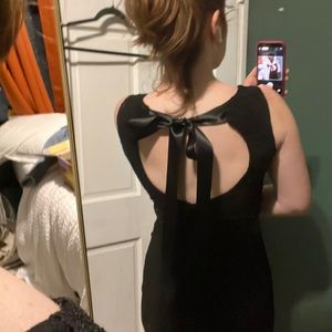 Black cocktail dress with lace overlay